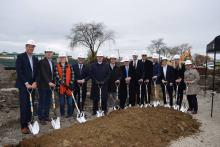 Group of people with shovels at the groundbreaking in Downers Grove